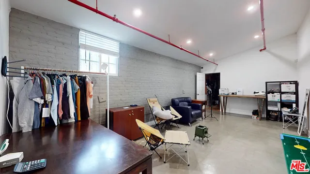 a utility room with a car parked car