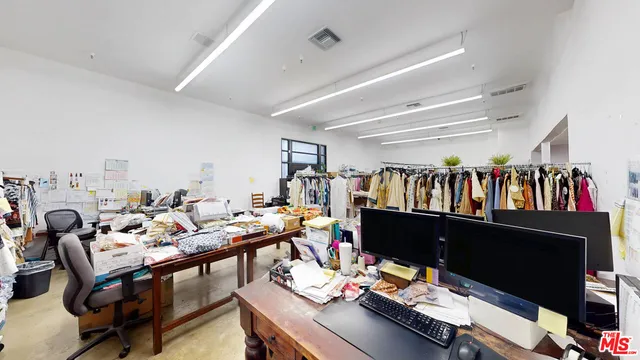 a bathroom with a toilet and a sink