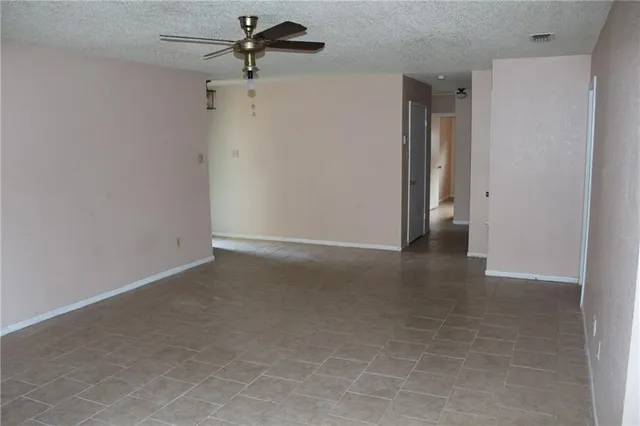 a view of a room with an empty space