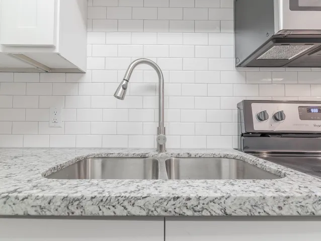 a close view of a sink and tap