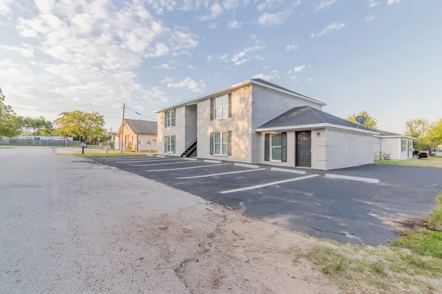 a view of backyard of a house
