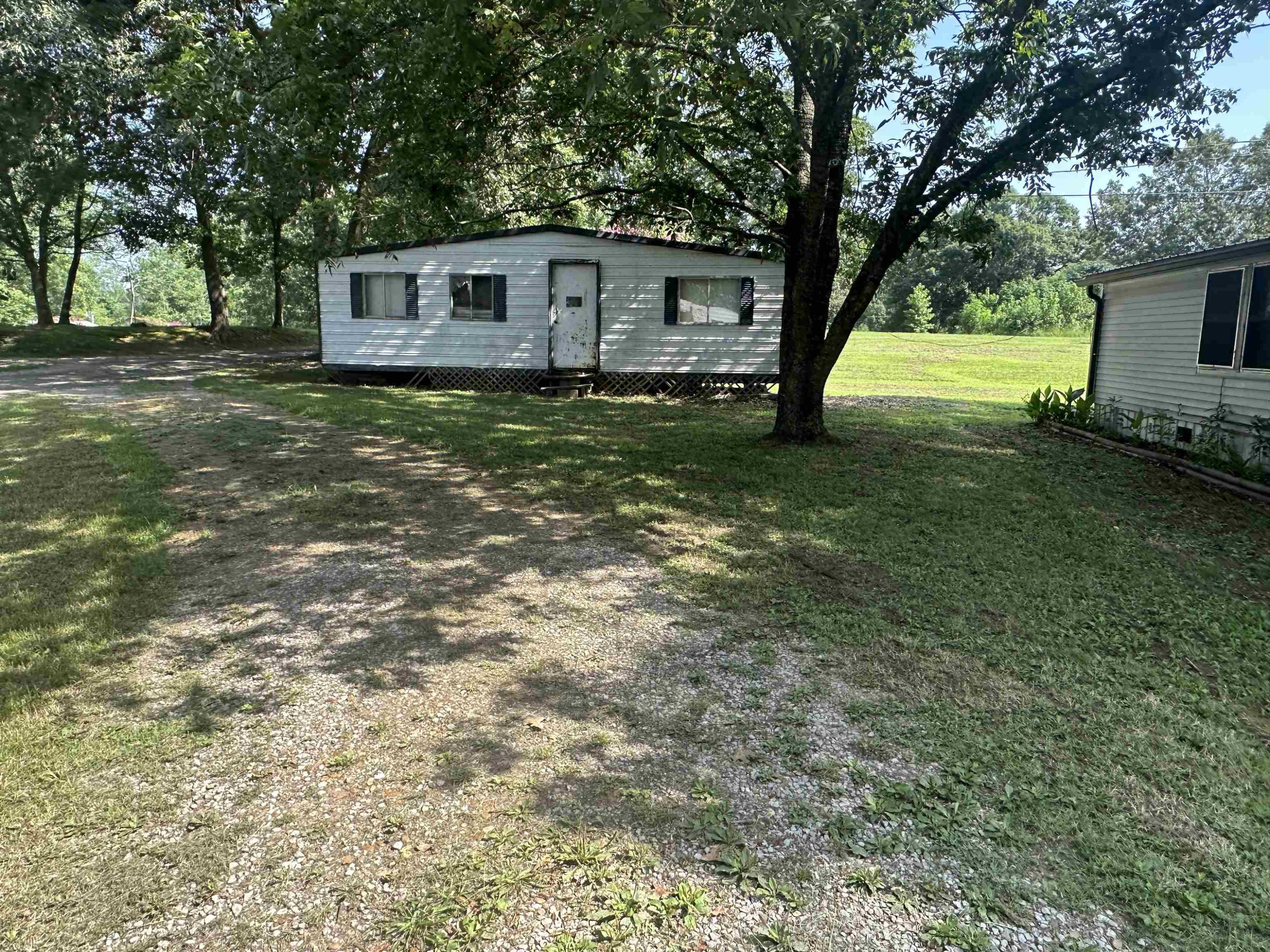 3702 Litt Wilson Road Finger, TN 38334 - Photo 3 of 14 a front view of a house with garden