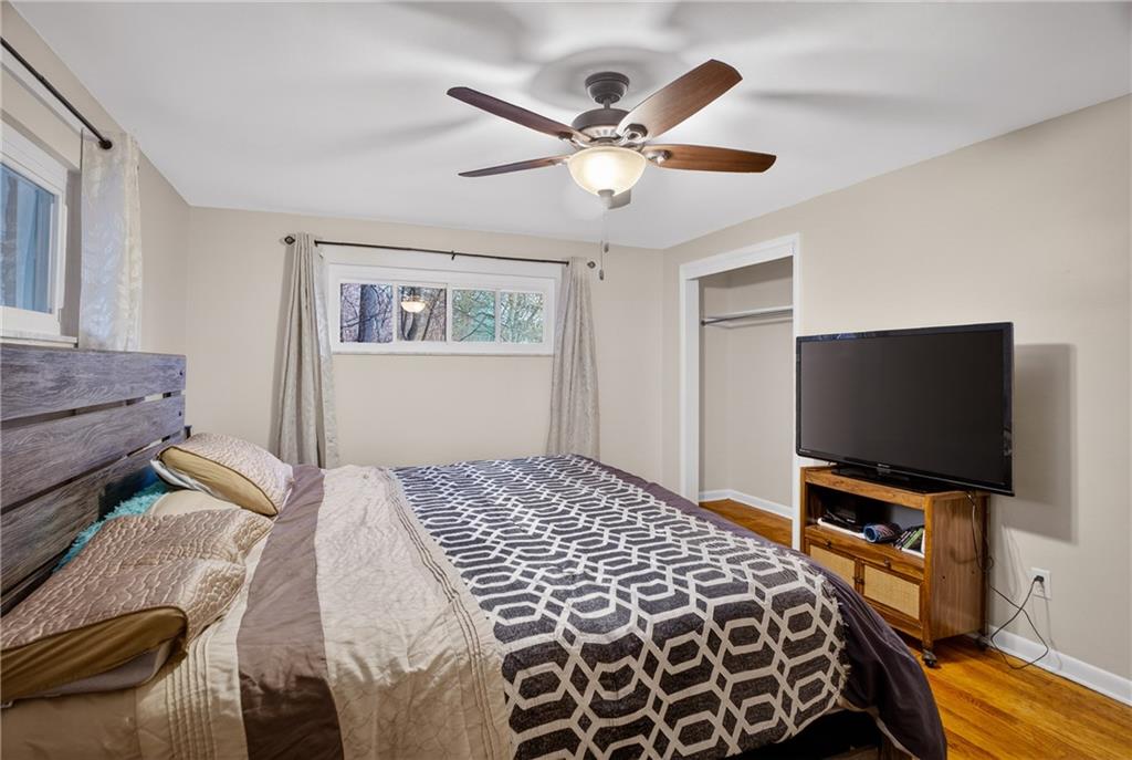 6361 Leechburg Road Verona, PA 15147 - Photo 11 of 26 a bedroom with a bed and a flat screen tv