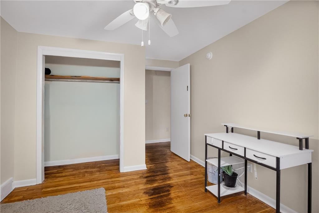 6361 Leechburg Road Verona, PA 15147 - Photo 14 of 26 a view of a room with wooden floor and staircase
