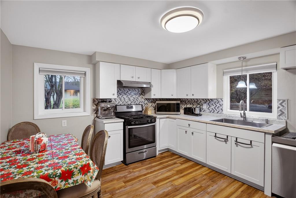 6361 Leechburg Road Verona, PA 15147 - Photo 7 of 26 a bedroom with a bed and a window