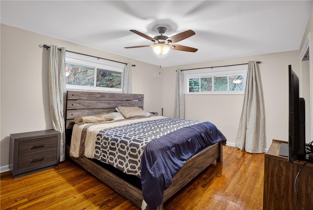 6361 Leechburg Road Verona, PA 15147 - Photo 10 of 26 a bedroom with a bed and a flat screen tv