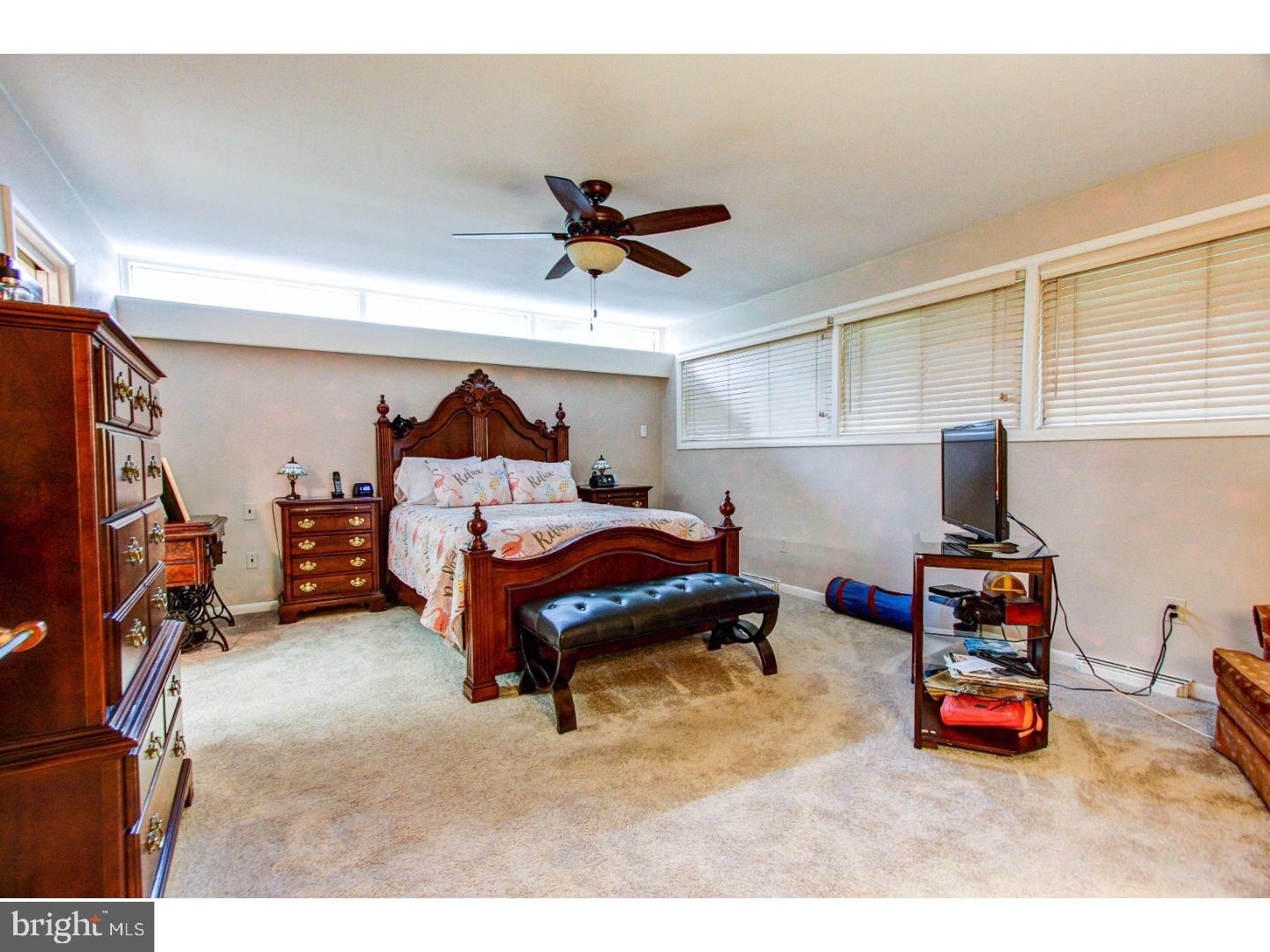 1008 Delene Road Rydal, PA 19046 - Photo 11 of 24 a bedroom with furniture and a lamp