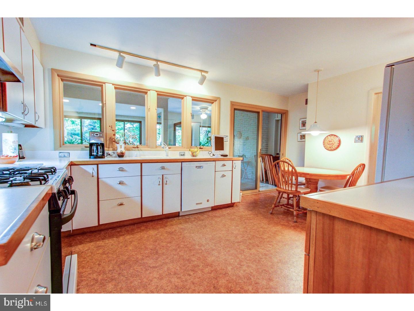 1008 Delene Road Rydal, PA 19046 - Photo 8 of 24 a view of a kitchen with furniture and a window