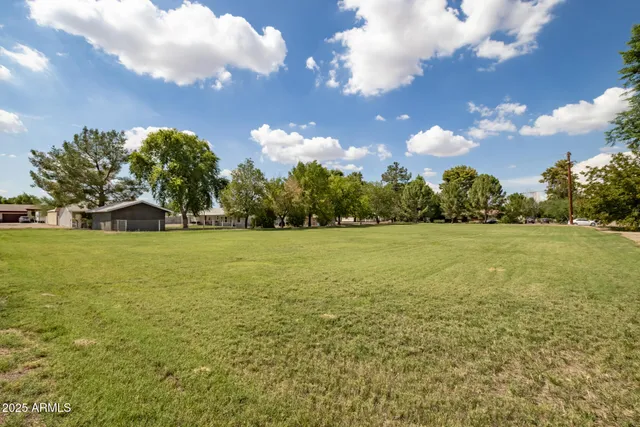 a view of house with outdoor space and street view