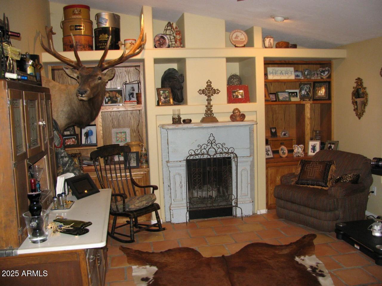 12417 East Cloud Road Chandler, AZ 85249 - Photo 38 of 40 a living room with furniture and a fireplace