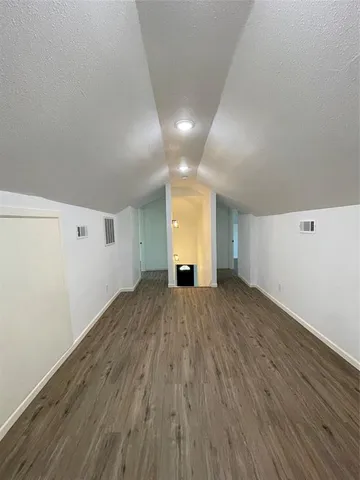 a bathroom with a toilet a sink and bathtub