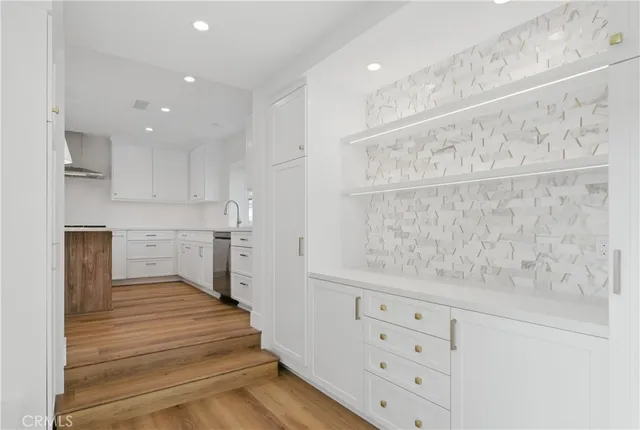 a view of room with wooden floor and window