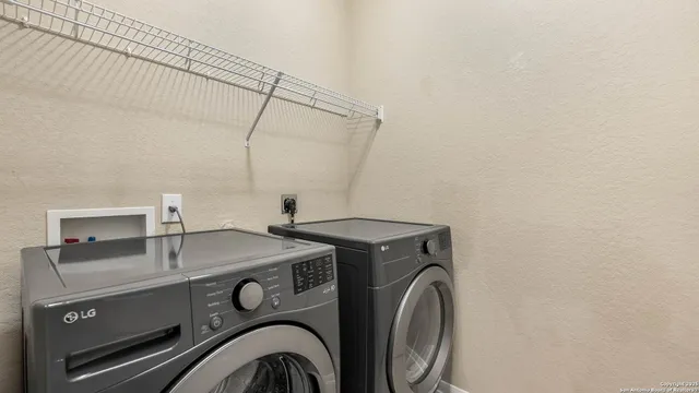 a utility room with dryer and washer
