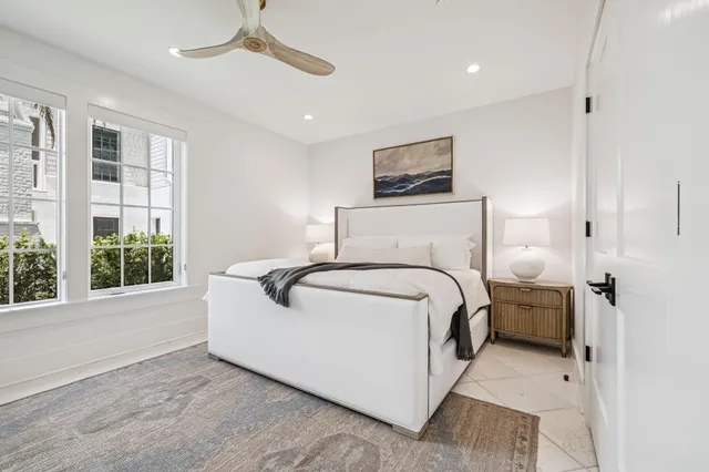a view of a bathroom with a sink and mirror