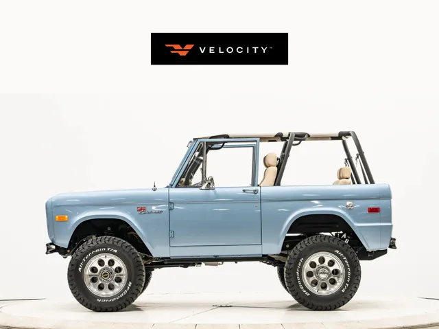 a view of a balcony with wooden floor