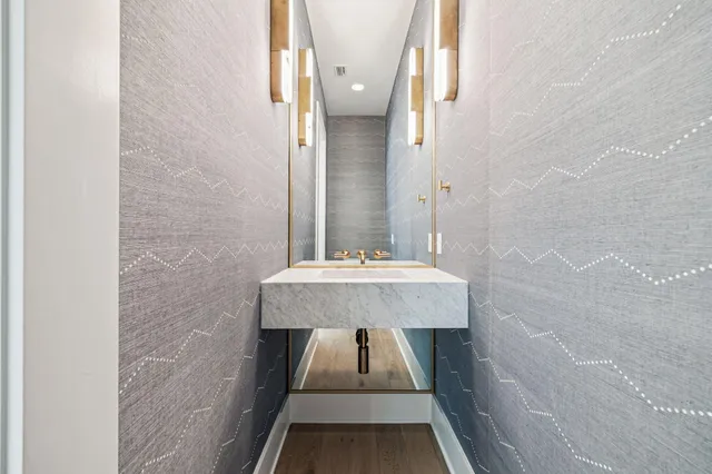 a view of a house with swimming pool and sitting area