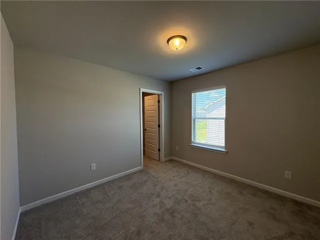 a bathroom with a toilet a sink and bathtub
