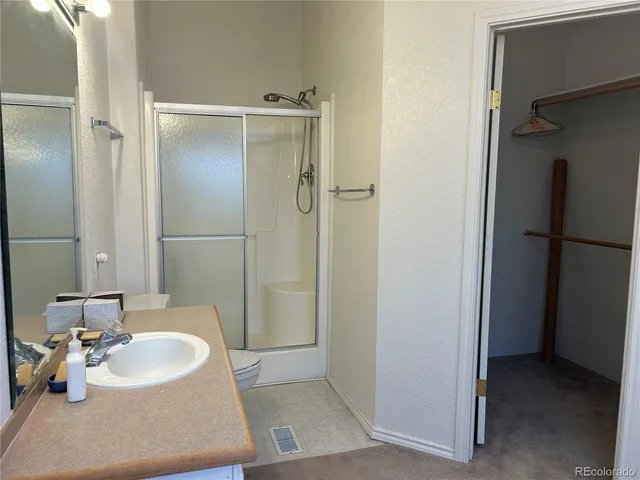 a view of a kitchen with a sink and dishwasher