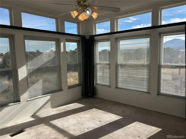 a view of an entryway with a chandelier