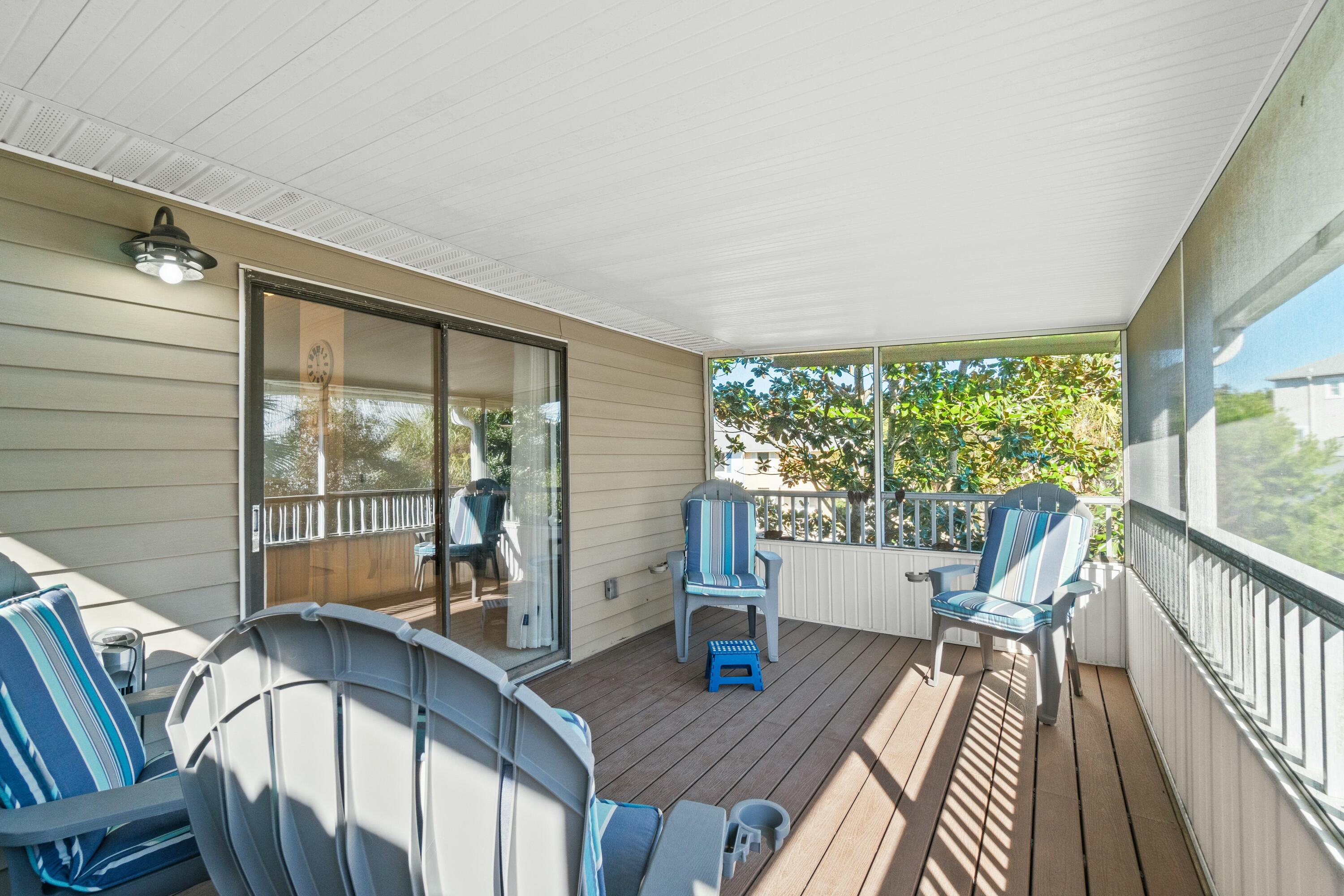 50 Gossamer Lane, Unit 12 Inlet Beach, FL 32461 - Photo 17 of 37 a view of deck with furniture and wooden floor