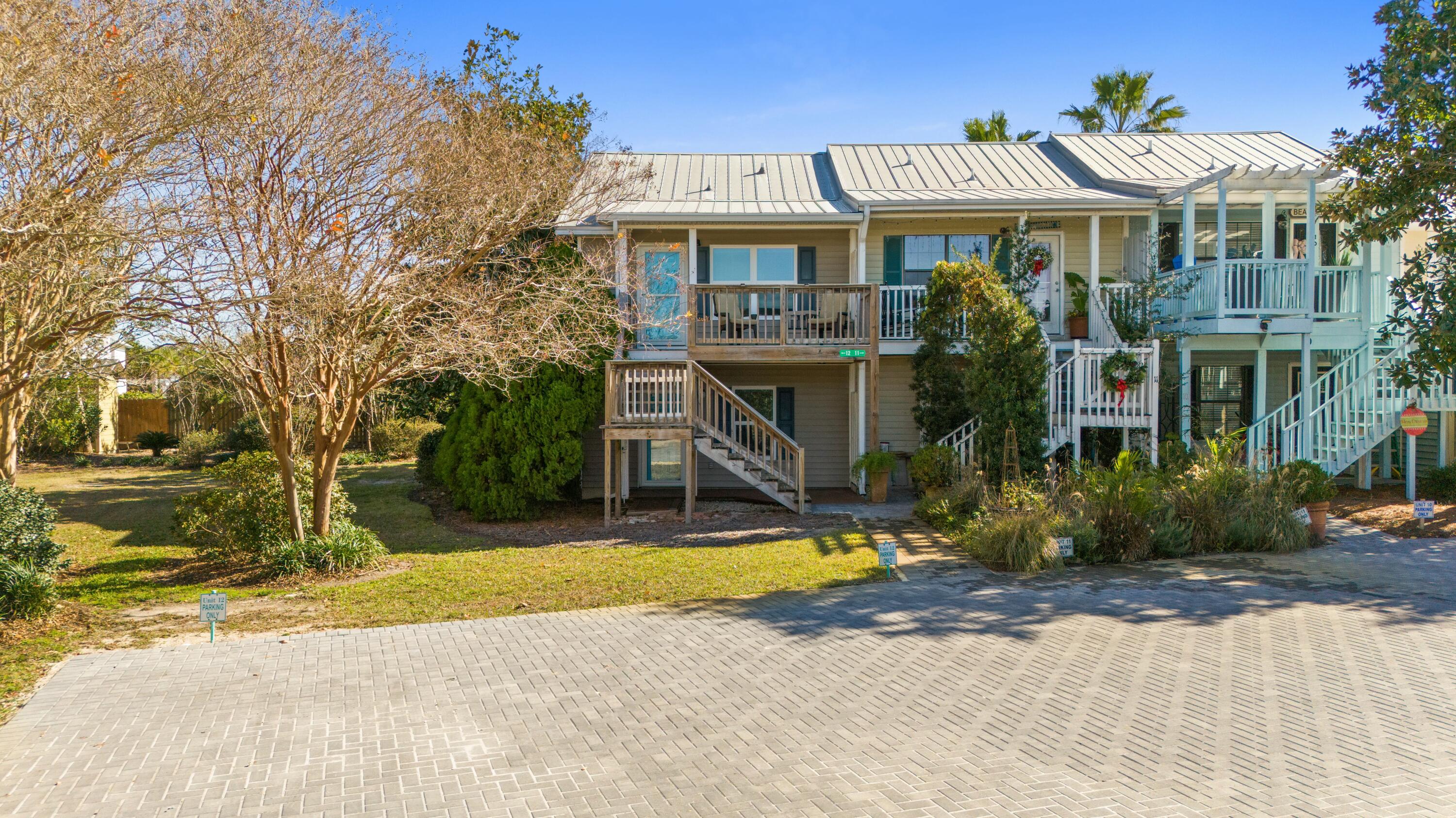 50 Gossamer Lane, Unit 12 Inlet Beach, FL 32461 - Photo 33 of 37 a view of outdoor space yard and front view of a house