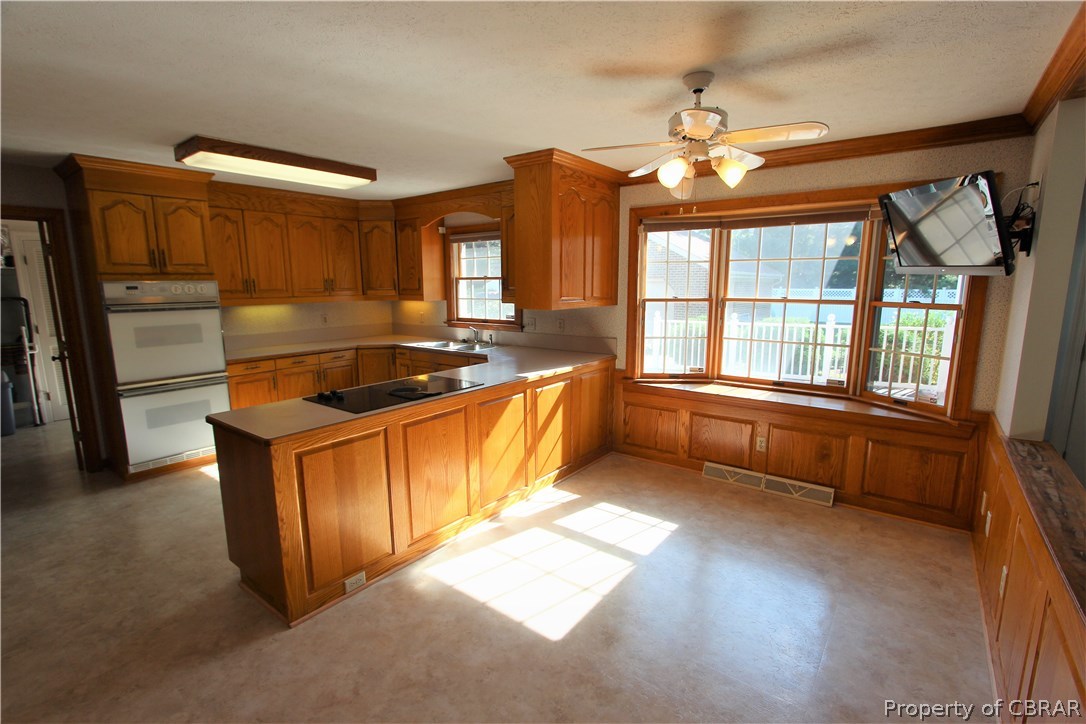 2893 Decatur Drive Hayes, VA 23072 - Photo 10 of 25 Large Breakfast Area with Bay Window and TV included!