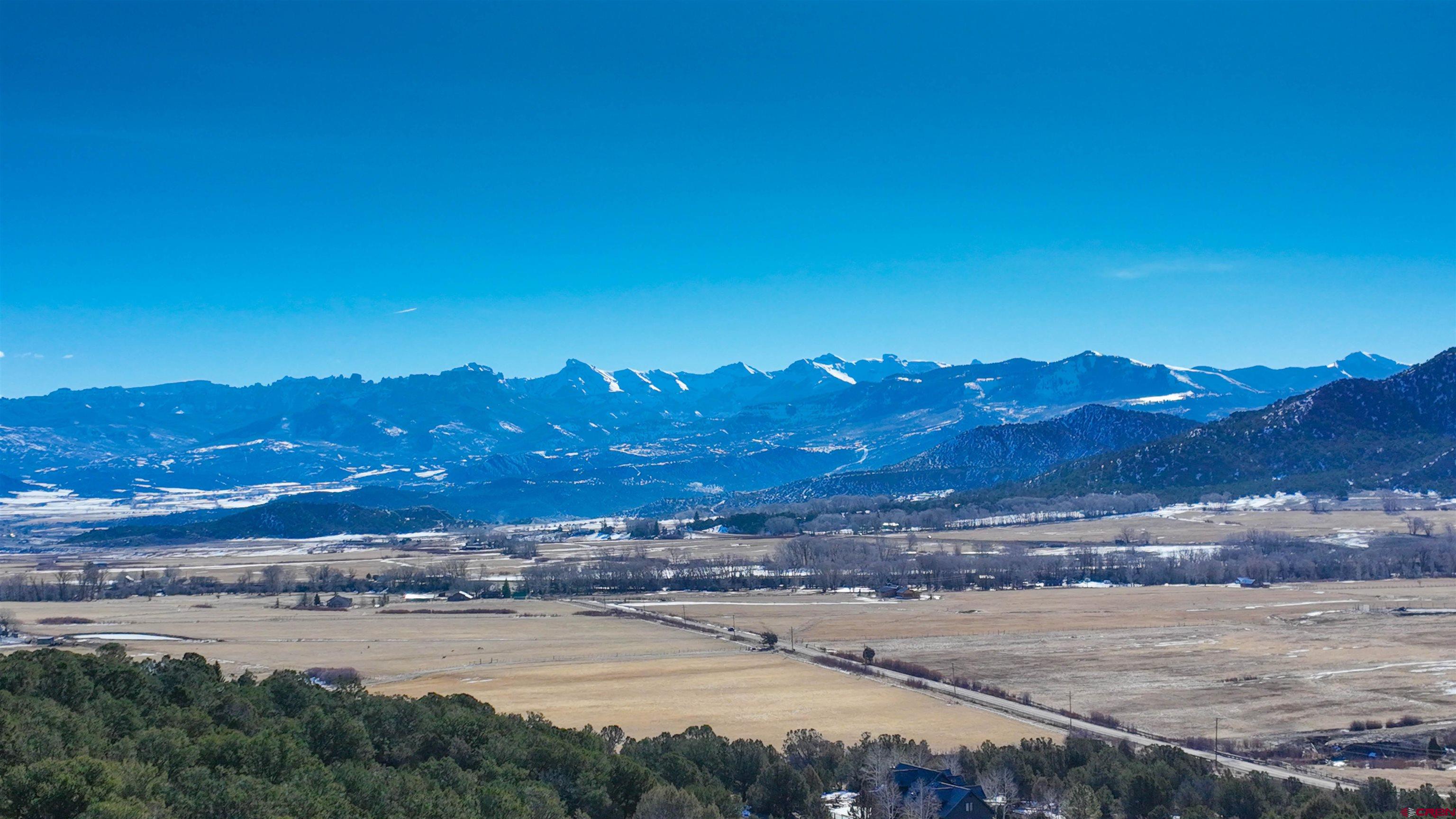 2461 Pleasant Point Drive Ridgway, CO 81432 - Photo 9 of 20 a view of an ocean and a mountain