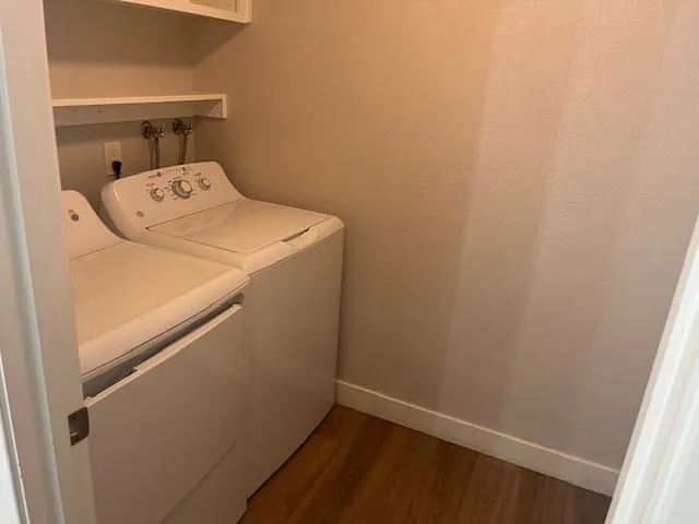 a utility room with dryer and washer