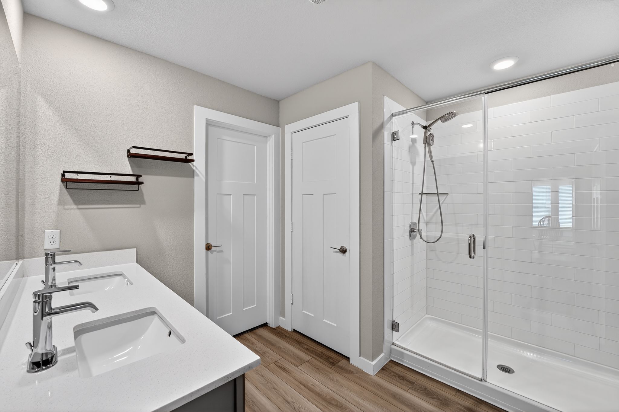 117 Halford Road Georgetown, TX 78633 - Photo 21 of 31 Full bathroom featuring double vanity, a shower stall, light wood-style flooring, and recessed lighting
