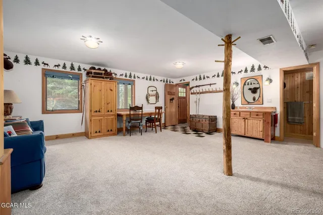 a bathroom with a shower and a door