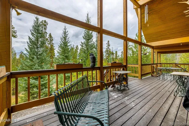 a view of balcony with wooden floor