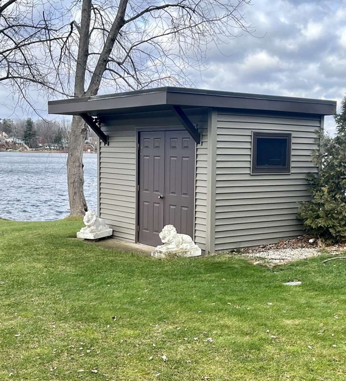 57 Chestnut Circle Suffield, CT 06093 - Photo 12 of 40 a front view of a house with garden