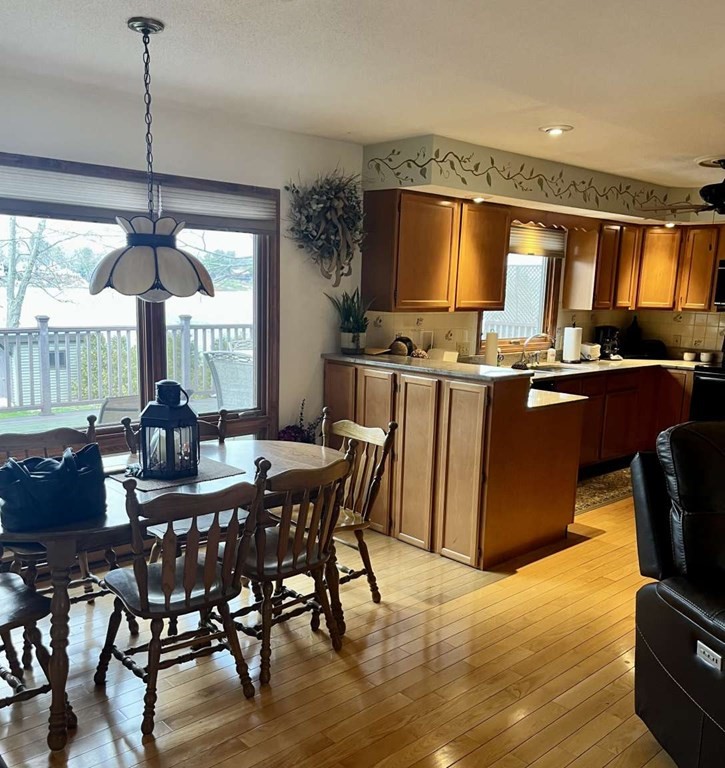 57 Chestnut Circle Suffield, CT 06093 - Photo 18 of 40 a view of a dining room with furniture window and outside view