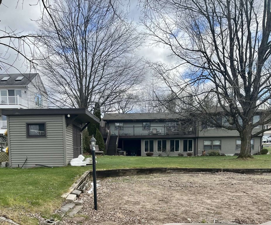 57 Chestnut Circle Suffield, CT 06093 - Photo 2 of 40 a front view of a house with a yard
