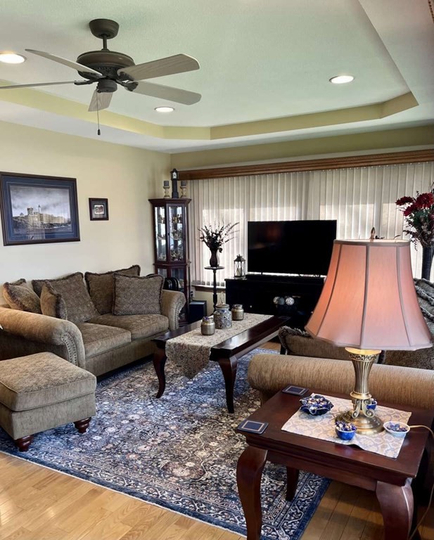 57 Chestnut Circle Suffield, CT 06093 - Photo 24 of 40 a living room with furniture and a flat screen tv