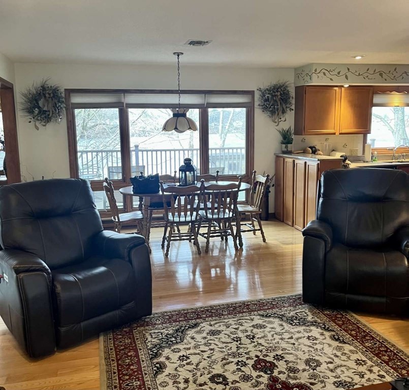 57 Chestnut Circle Suffield, CT 06093 - Photo 26 of 40 a living room with furniture and a flat screen tv