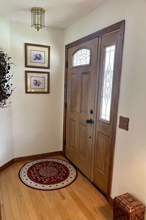 57 Chestnut Circle Suffield, CT 06093 - Photo 32 of 40 a view of a hallway with bed and a window
