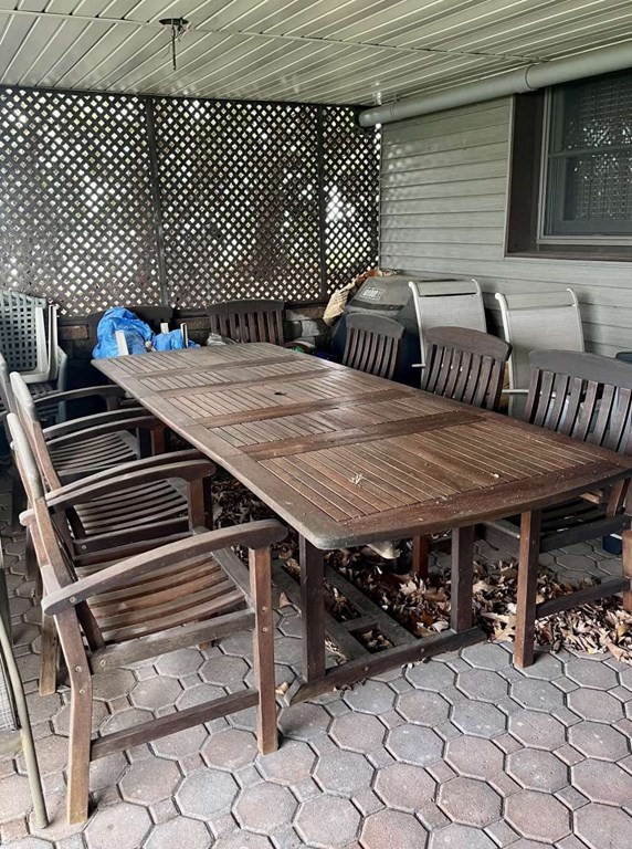 57 Chestnut Circle Suffield, CT 06093 - Photo 39 of 40 a view of a chairs and table in the patio