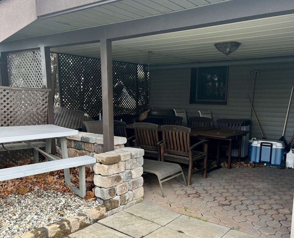 57 Chestnut Circle Suffield, CT 06093 - Photo 40 of 40 a backyard of a house with outdoor seating