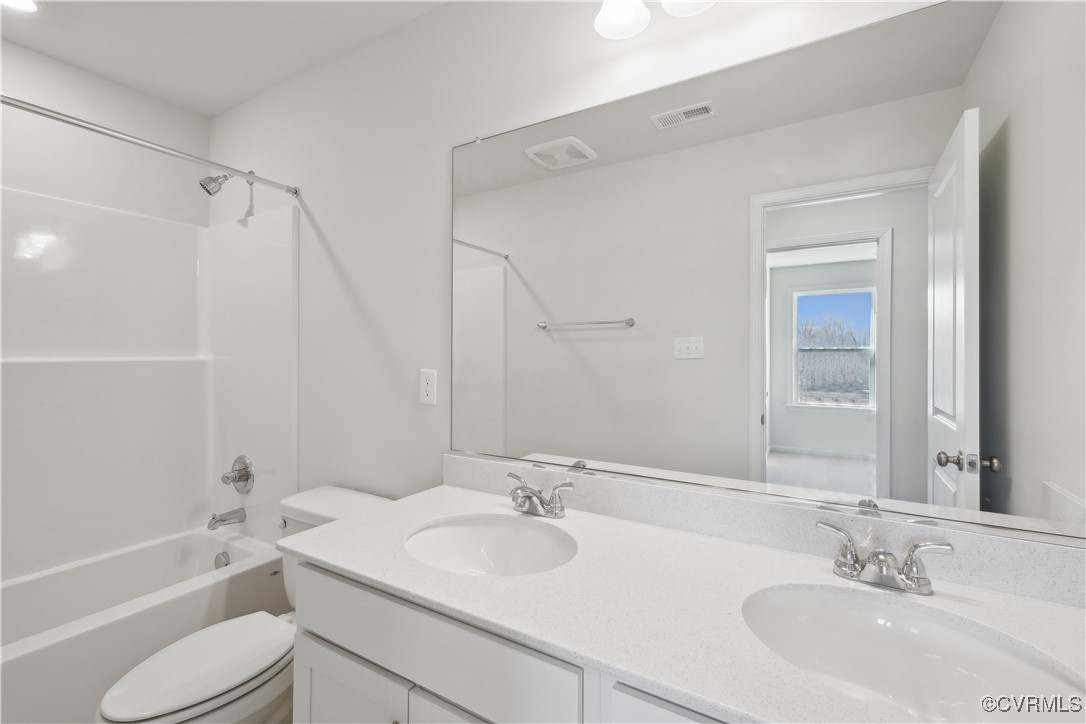 229 Bellevue Circle Aylett, VA 23009 - Photo 14 of 18 a bathroom with a sink toilet tub and shower