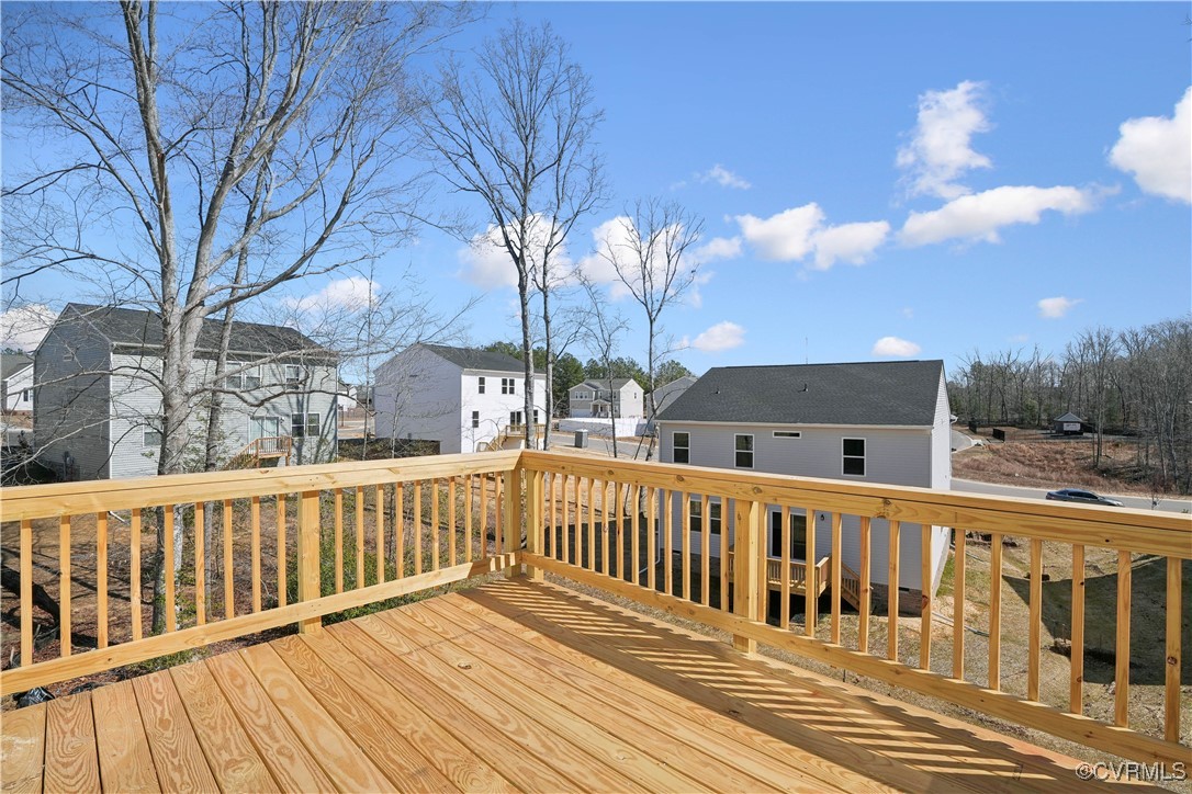 229 Bellevue Circle Aylett, VA 23009 - Photo 17 of 18 a view of a wooden deck and city view