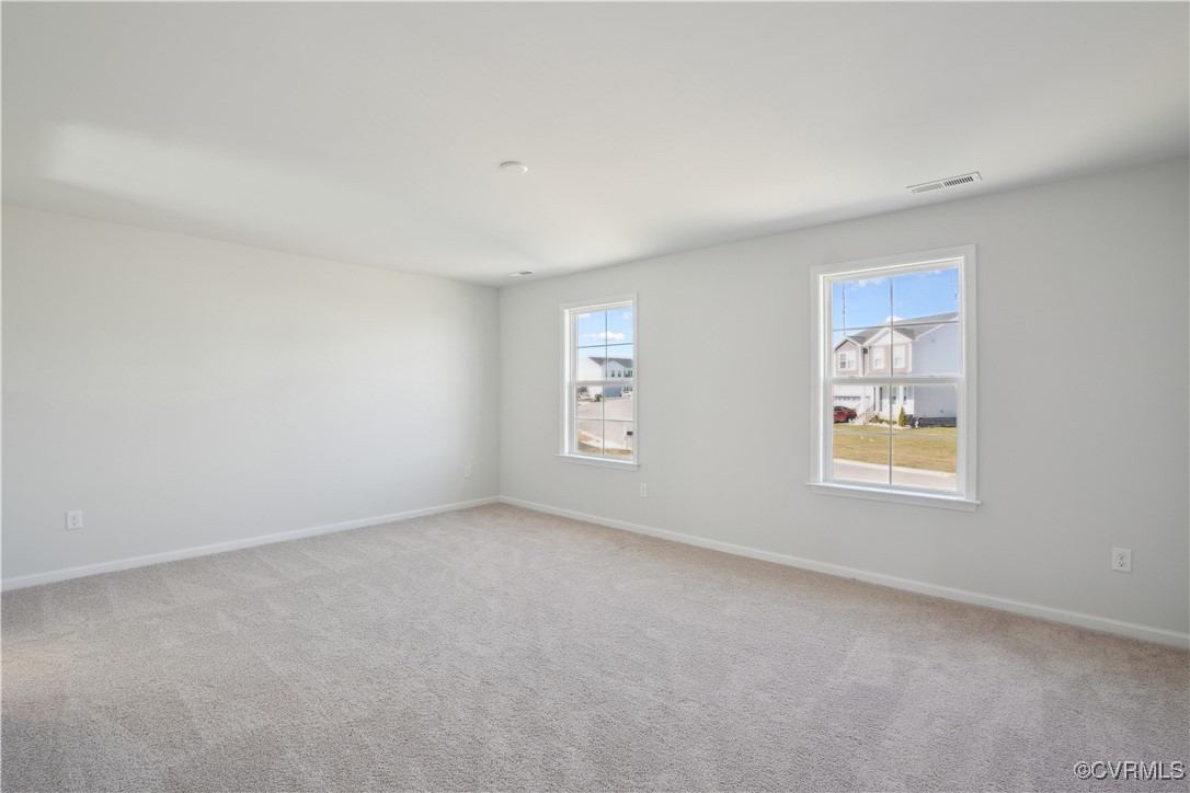 229 Bellevue Circle Aylett, VA 23009 - Photo 10 of 18 an empty room with windows