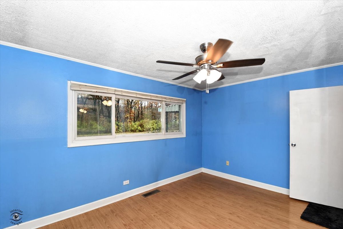 160 Monee Road Park Forest, IL 60466 - Photo 11 of 24 a view of an empty room with a window