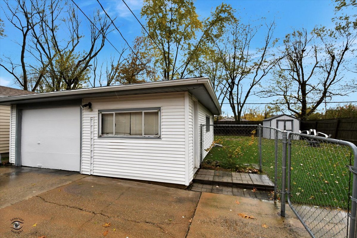 160 Monee Road Park Forest, IL 60466 - Photo 18 of 24 a view of a backyard with a garden
