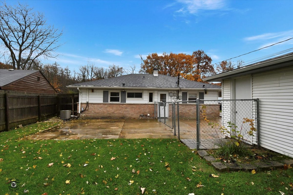 160 Monee Road Park Forest, IL 60466 - Photo 24 of 24 a front view of a house with a yard
