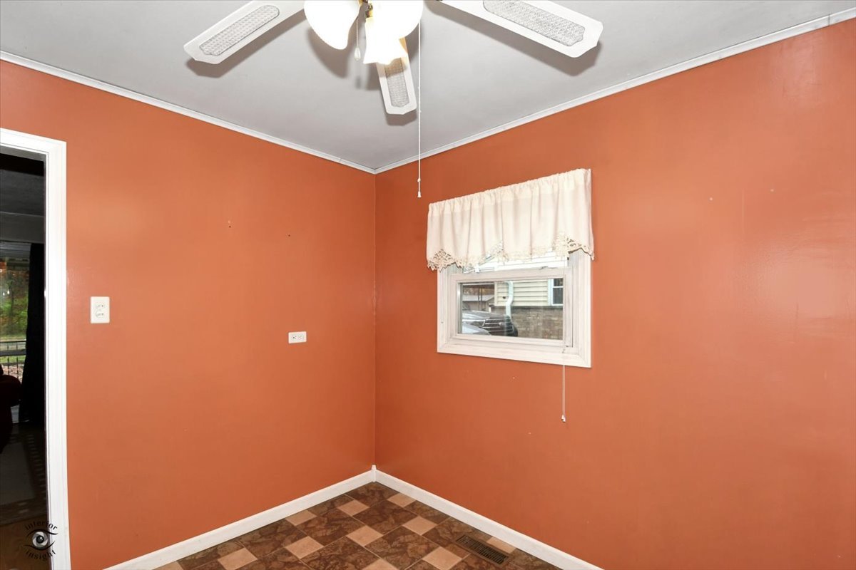 160 Monee Road Park Forest, IL 60466 - Photo 9 of 24 a view of an empty room with a window