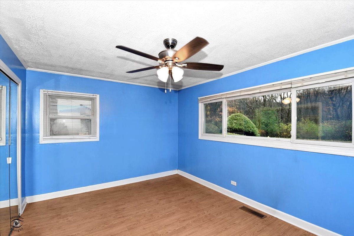 160 Monee Road Park Forest, IL 60466 - Photo 10 of 24 a view of an empty room with a window
