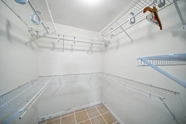 a view of a room with racks on the wall