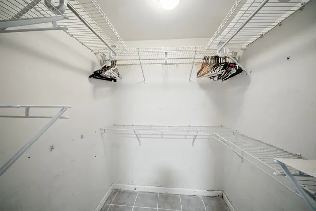 a view of a room with racks on the wall