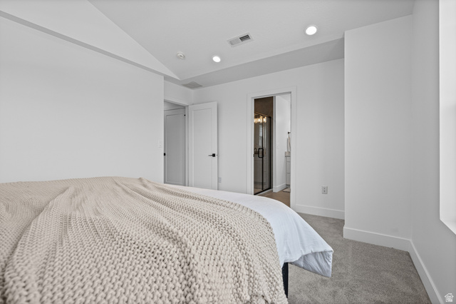 340 East 7635 S Street Sandy, UT 84047 - Photo 16 of 32 Bedroom featuring light carpet, vaulted ceiling, recessed lighting, and connected bathroom